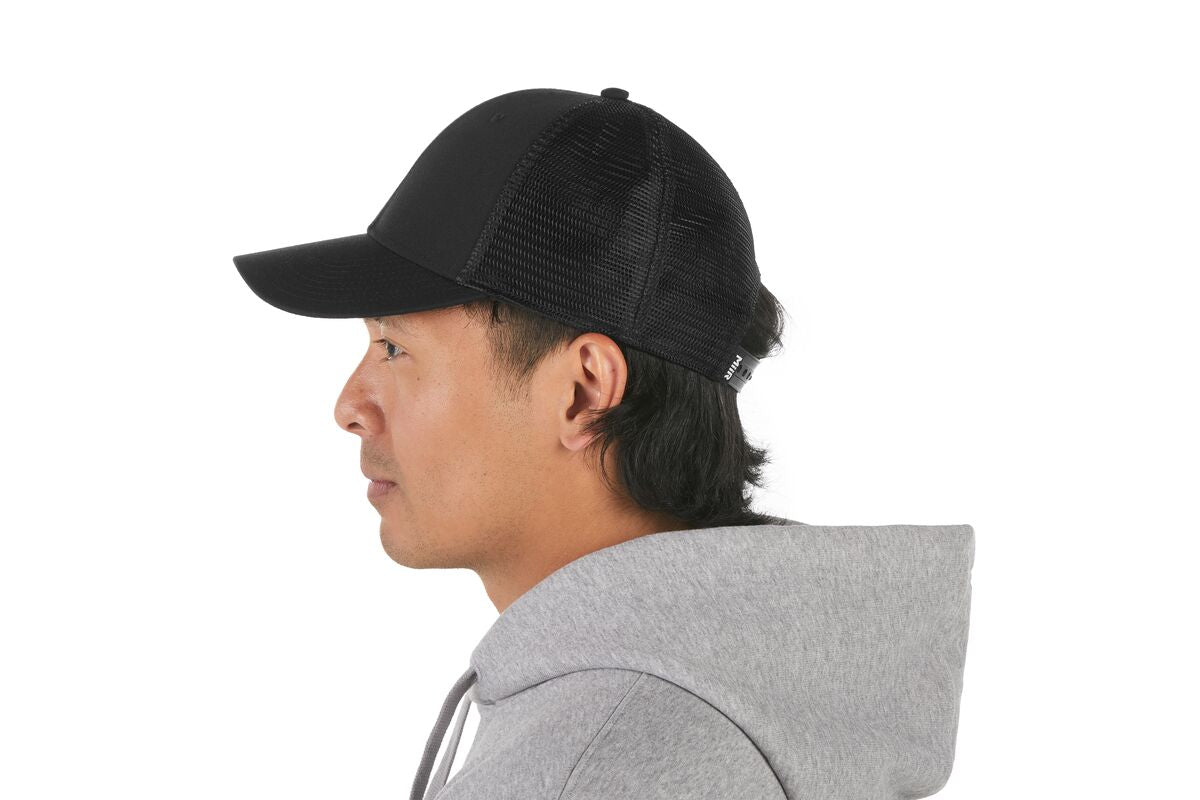 recycled-poly-low-profile-trucker-hat-r6 WebPDP-HAT002002_Recycled_Poly_Low_Profile_Trucker_Hat_Black_Studio_Harper_Studios_0723_Back__HAT002002OS.jpg